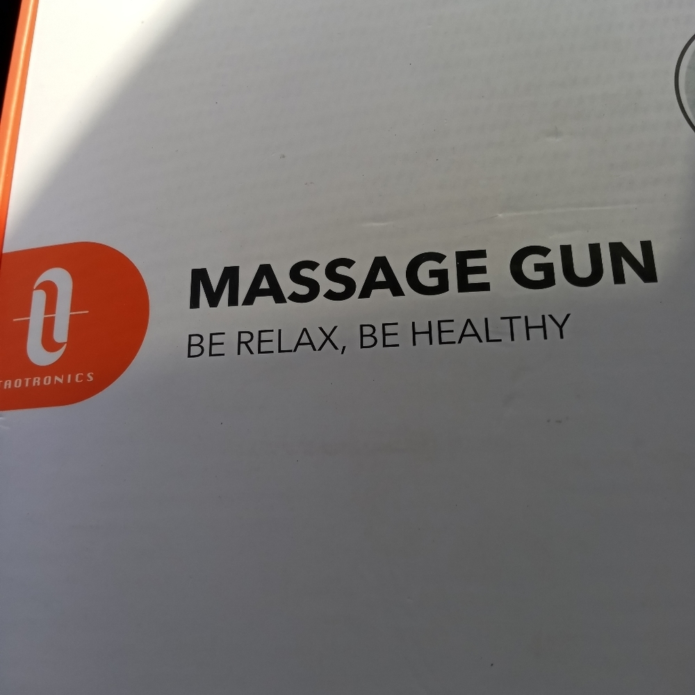 Massage gun brand new in the box all accessories included